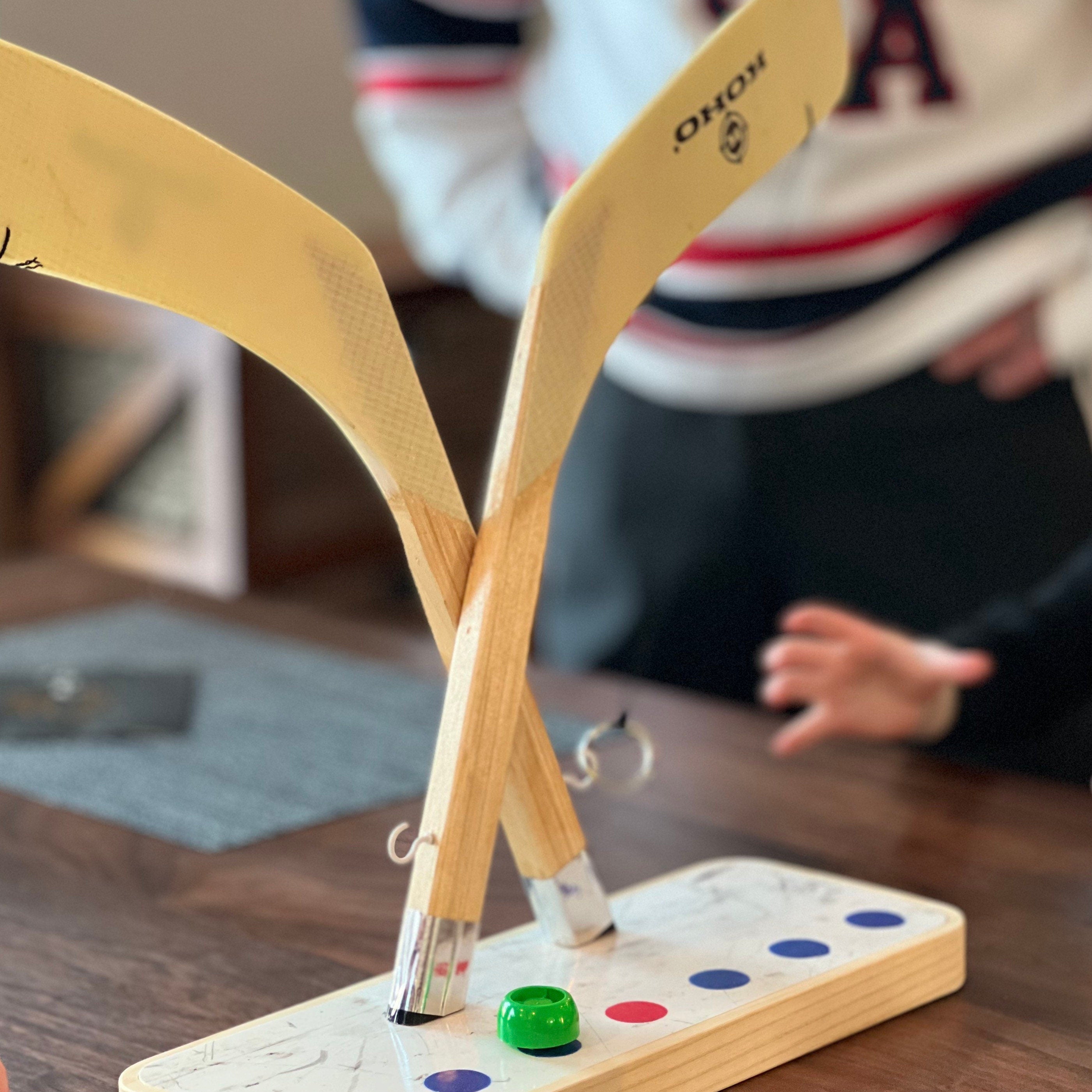 Hockey Stick Ring Toss Made with Salvaged Hockey Sticks and Hockey B